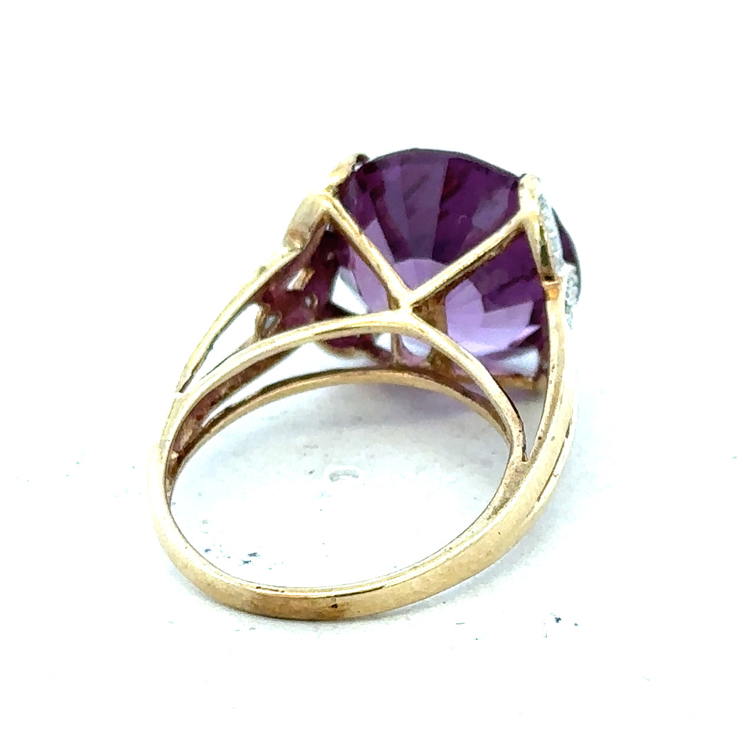 9ct yellow gold diamond ring in size M with a sparkling diamond centerpiece, unbranded jewelry showing intricate gold detailing.