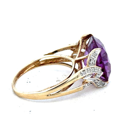 9ct yellow gold diamond ring in size M, featuring a sparkling diamond set in a sleek, unbranded design.
