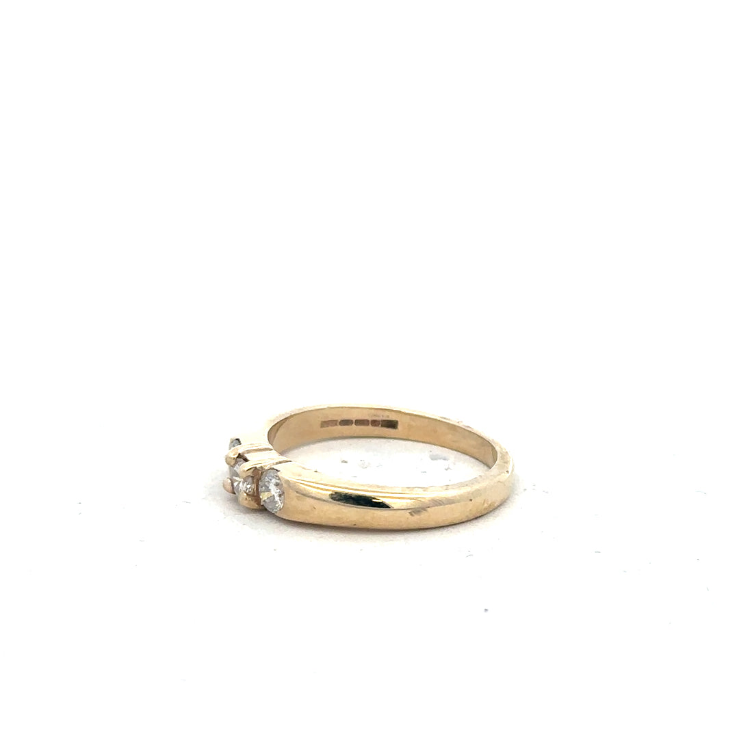 9ct yellow gold diamond ring in size M with sparkling diamonds, unbranded jewelry piece on a neutral background.