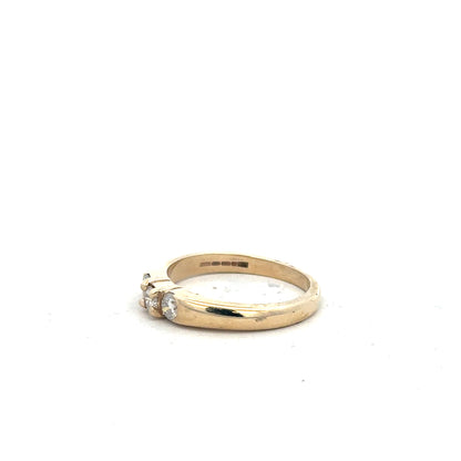 9ct yellow gold diamond ring in size M with sparkling diamonds, unbranded jewelry piece on a neutral background.