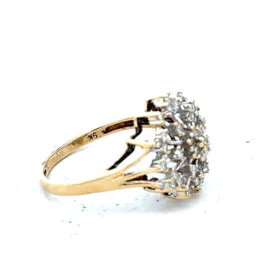 9ct yellow gold diamond ring in size M1/2, featuring sparkling diamonds, weighs 2.4 grams, unbranded jewelry accessory.