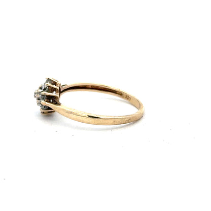 9ct yellow gold diamond ring in size M1/2 with sparkling diamonds, showcasing elegant jewelry design.