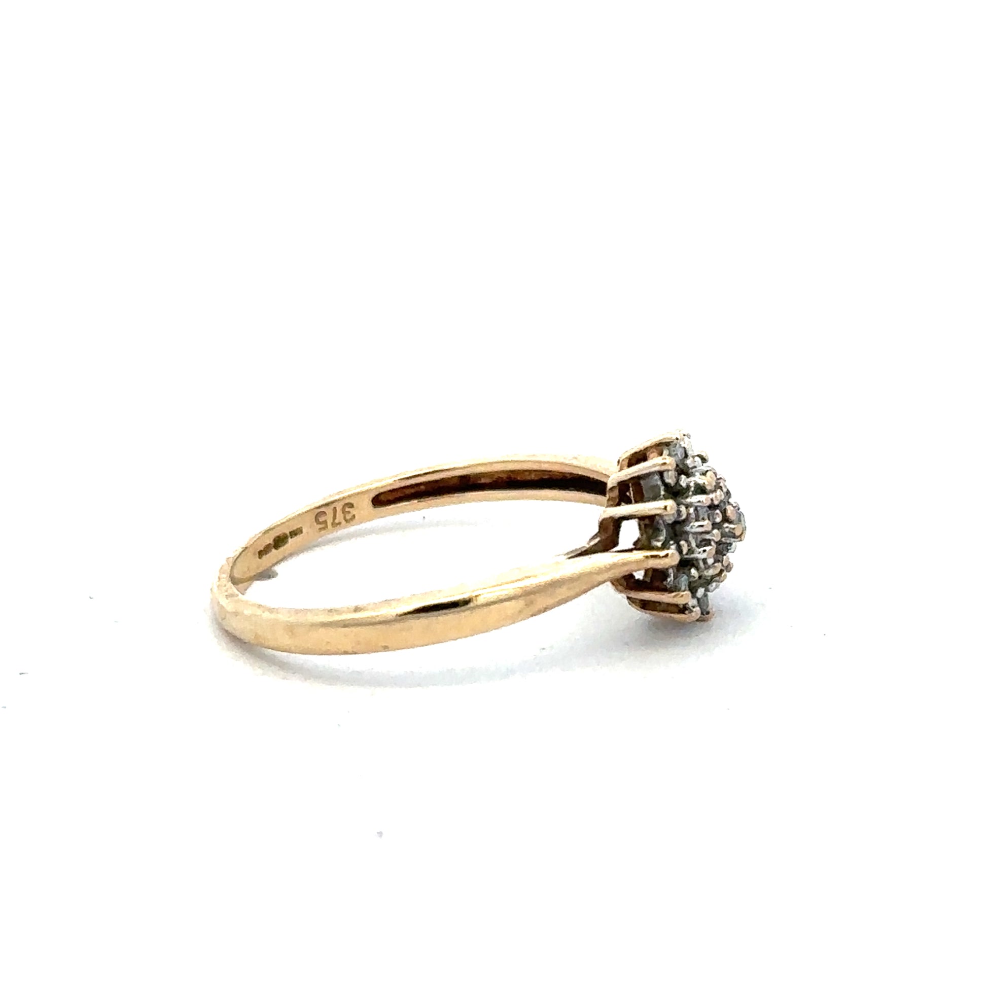 9ct yellow gold diamond ring size M1/2 with sparkling diamonds, displayed on a neutral background.