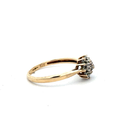 9ct yellow gold diamond ring size M1/2 with sparkling diamonds, displayed on a neutral background.