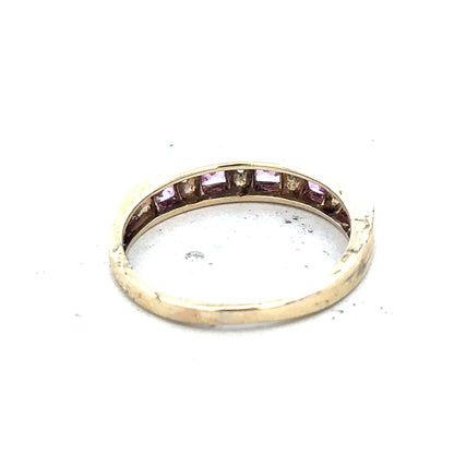 9ct yellow gold diamond ring in size N with a delicate design, featuring sparkling diamonds on a polished gold band.