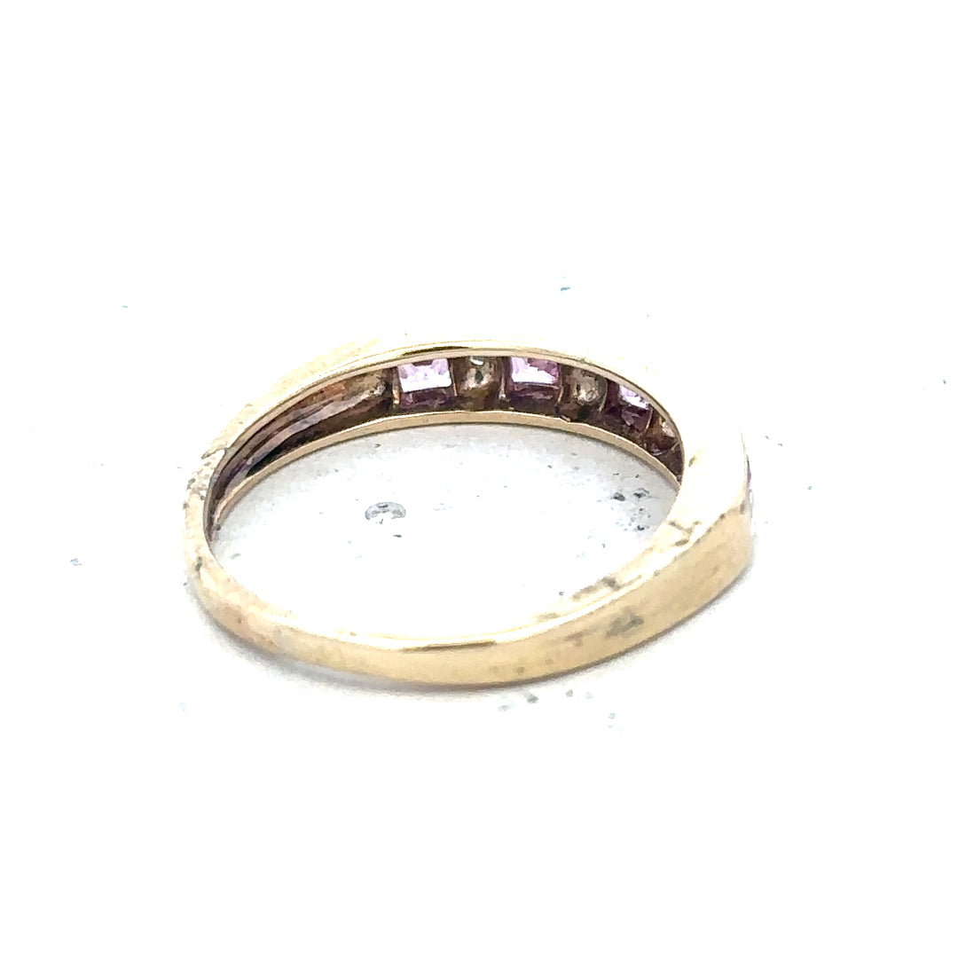 9ct yellow gold diamond ring in size N, featuring a sparkling diamond set in a simple, elegant band.