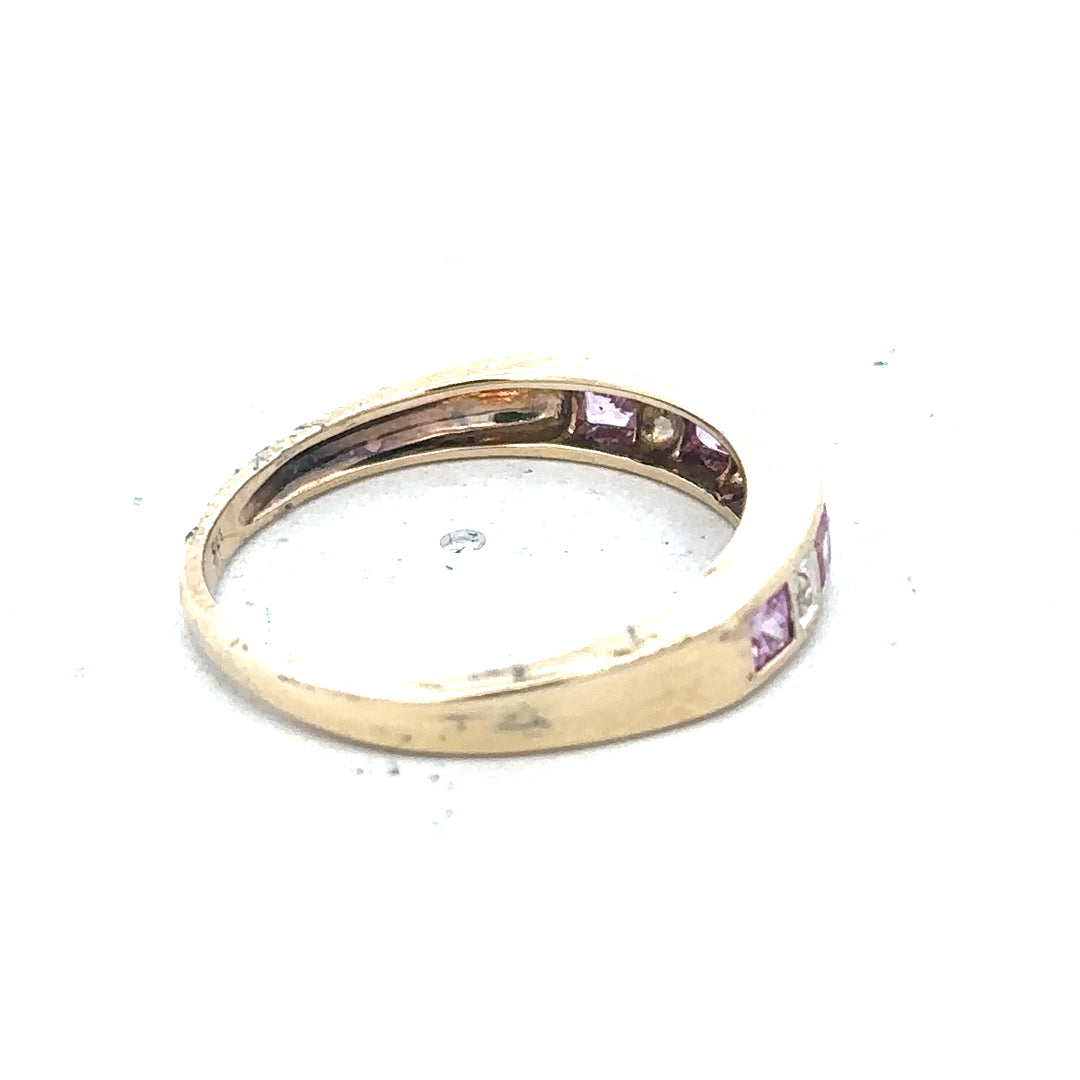 9ct yellow gold diamond ring in size N, featuring a sparkling central diamond and elegant band design.