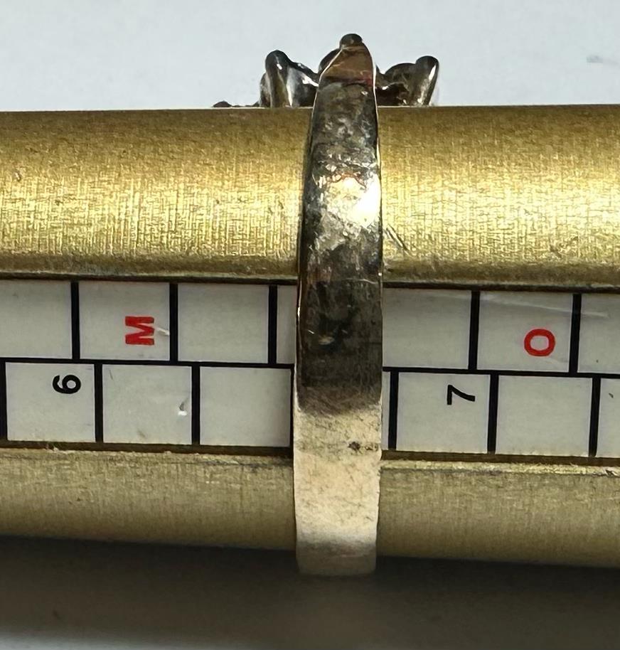 9ct yellow gold diamond ring in size N, featuring a central diamond and delicate band, unbranded jewelry accessory.