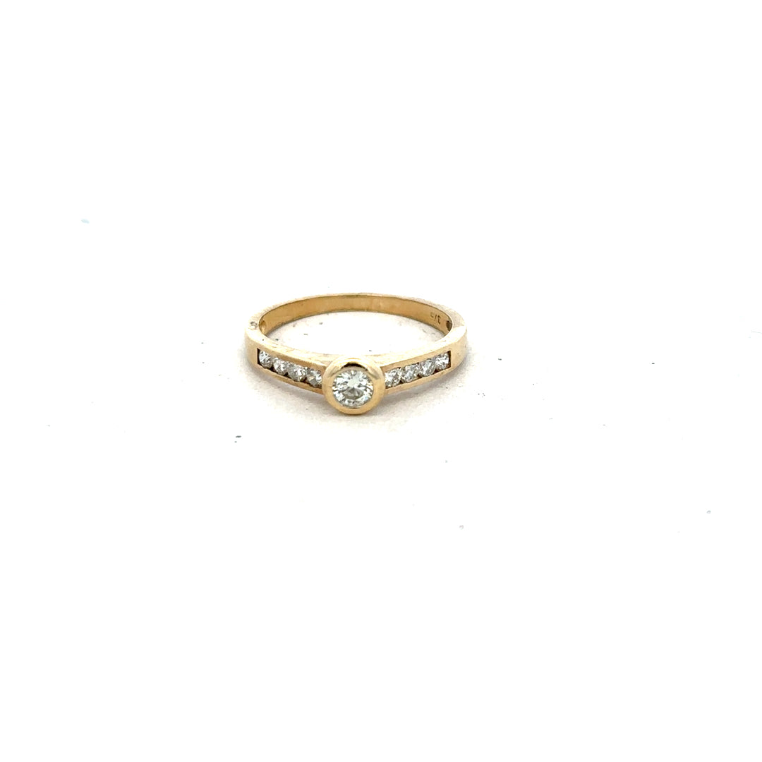9ct yellow gold diamond ring in size N, featuring a sparkling diamond and elegant design, unbranded jewelry accessory.