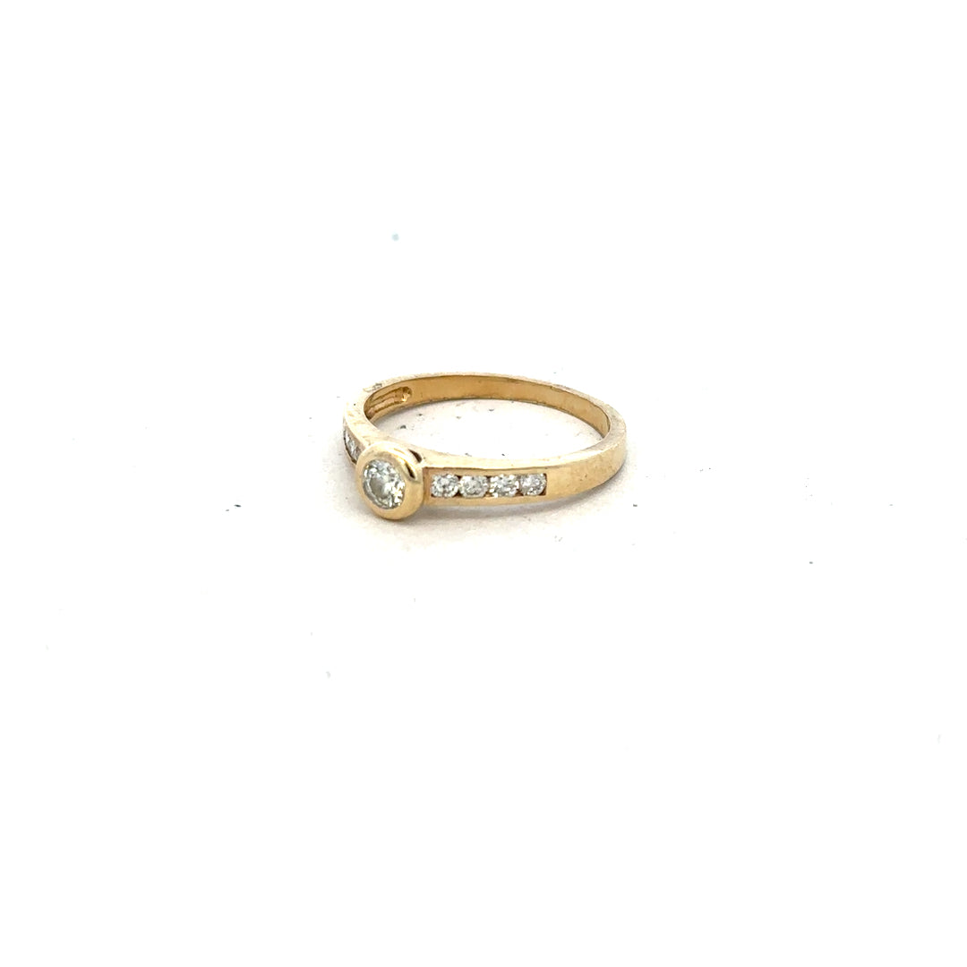 9ct yellow gold diamond ring in size N, featuring a sparkling diamond setting on a classic band.