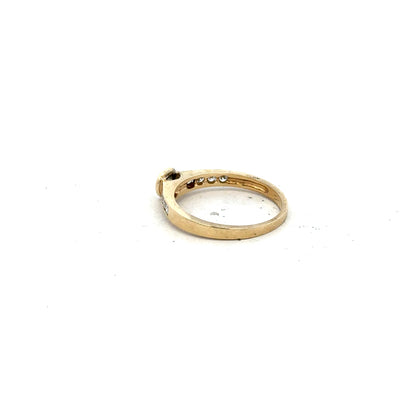 9ct yellow gold diamond ring in size N featuring a sparkling central diamond, unbranded jewelry piece.