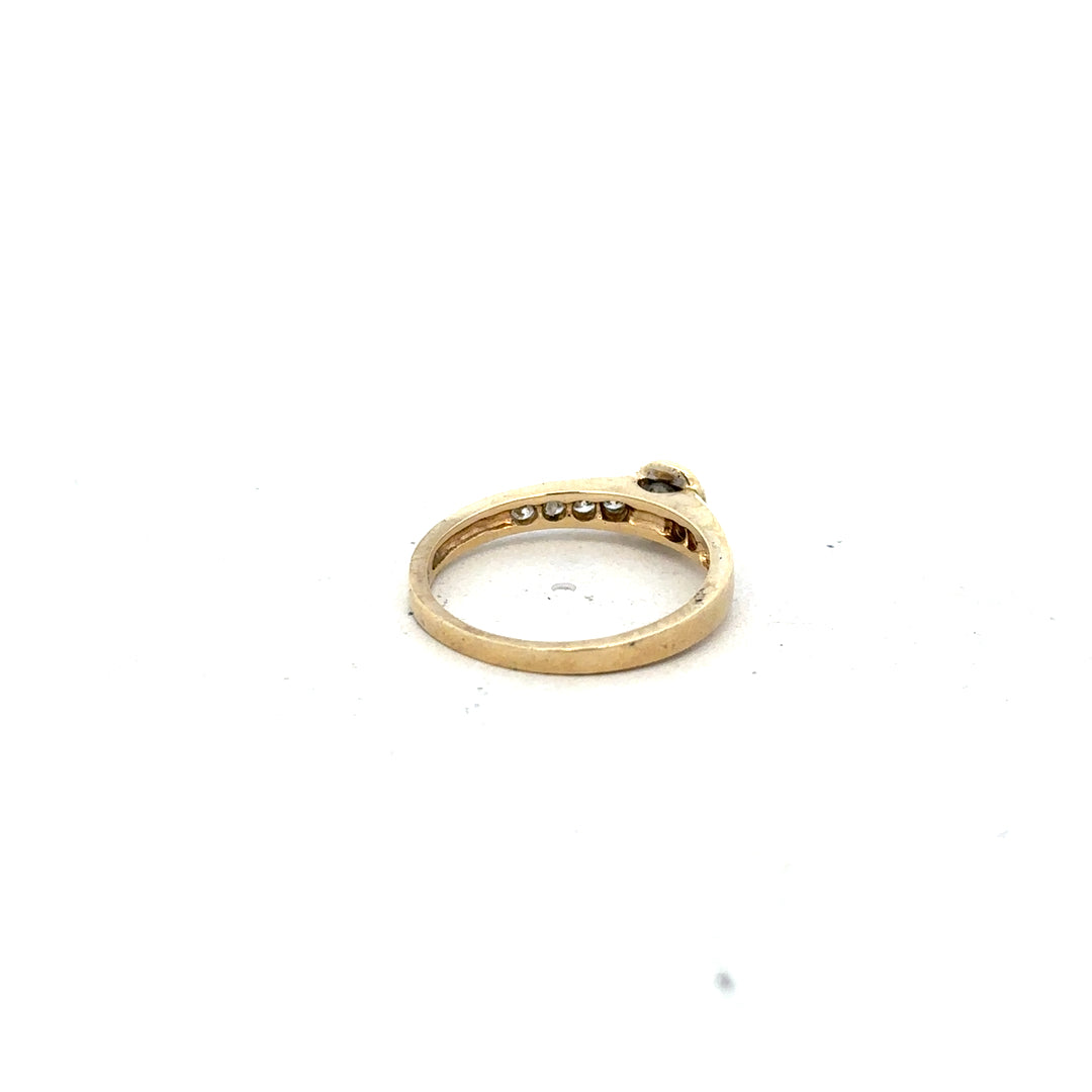 9ct yellow gold diamond ring in size N with sparkling diamonds, unbranded jewelry piece suitable for elegant occasions.