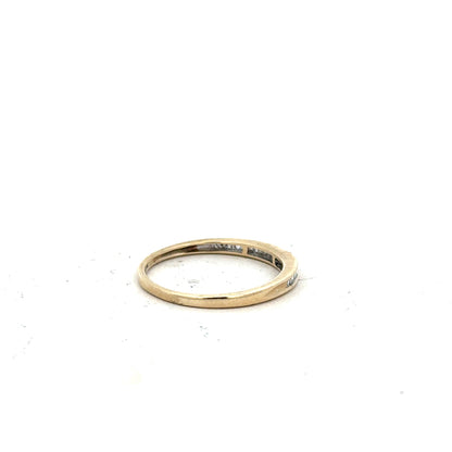 9ct yellow gold diamond ring size N1/2 featuring a sparkling diamond set in an elegant unbranded design.