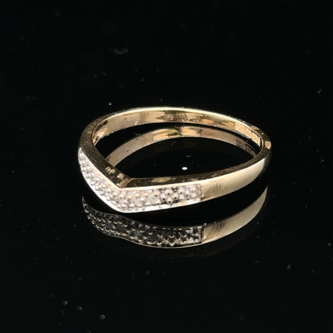 9ct yellow gold diamond ring in size P with sparkling diamonds, showcasing a classic and elegant jewelry piece.