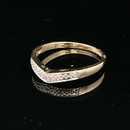 9ct yellow gold diamond ring in size P with sparkling diamonds, showcasing a classic and elegant jewelry piece.