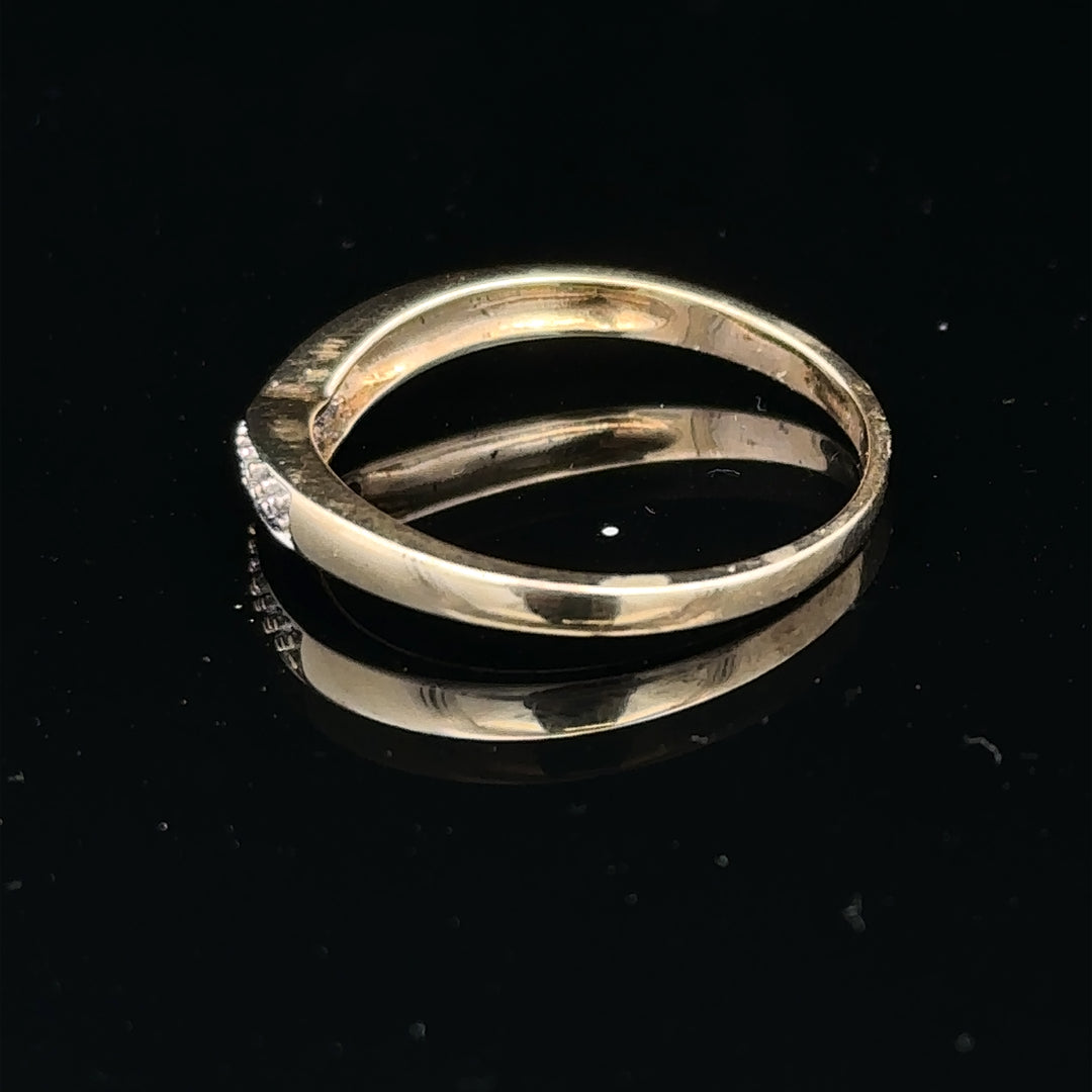 9ct yellow gold diamond ring in size P, featuring a sparkling diamond setting and a classic band design.