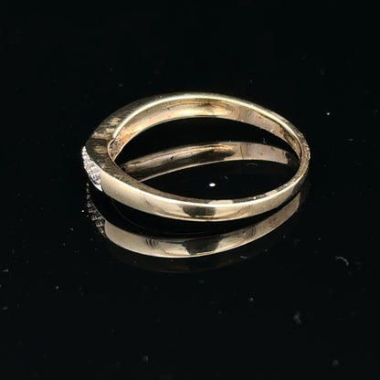 9ct yellow gold diamond ring in size P, featuring a sparkling diamond setting and a classic band design.