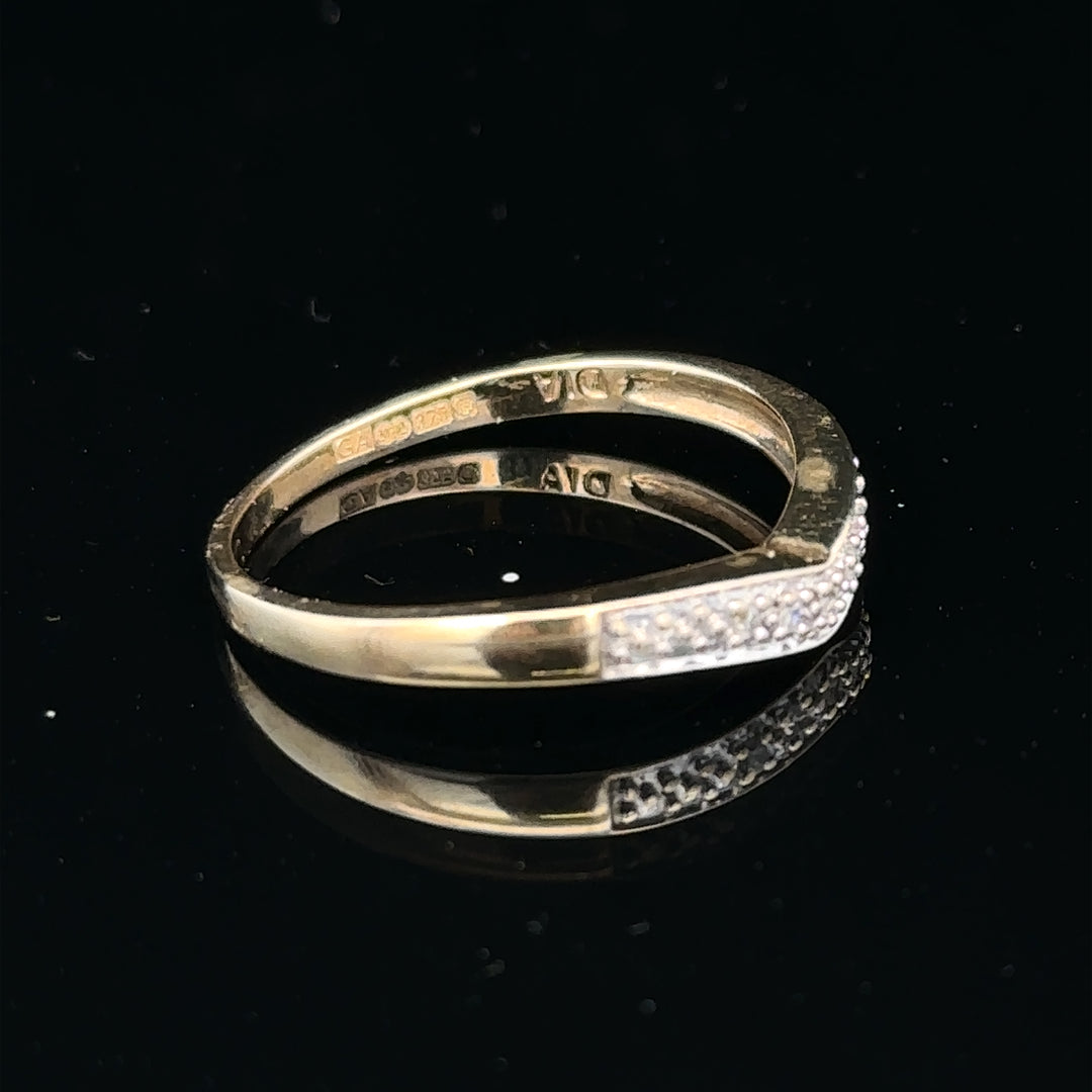 9ct yellow gold diamond ring in size P with a sparkling central diamond and elegant band, unbranded jewelry.