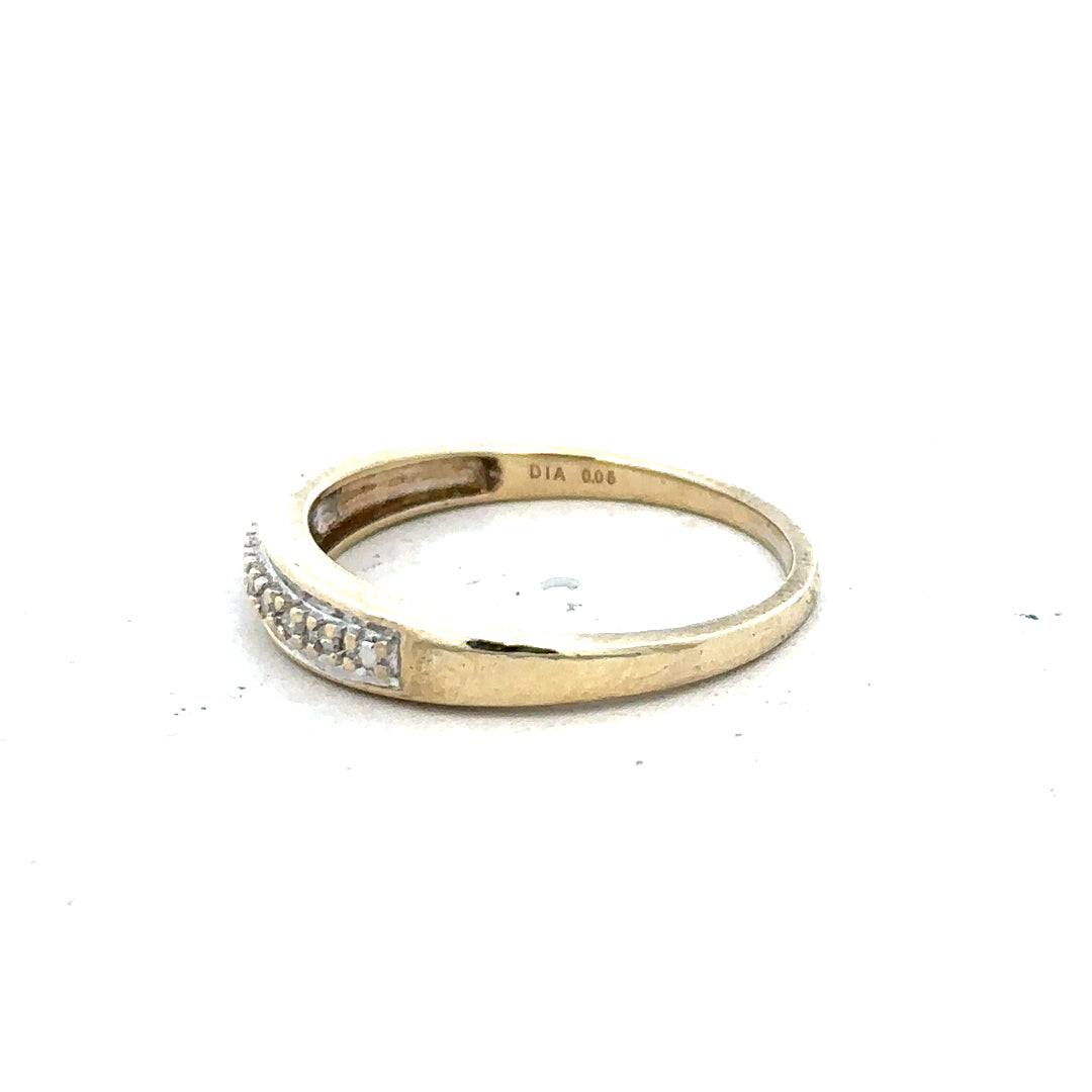9ct yellow gold diamond ring in size P, featuring a sparkling diamond set in a classic band.