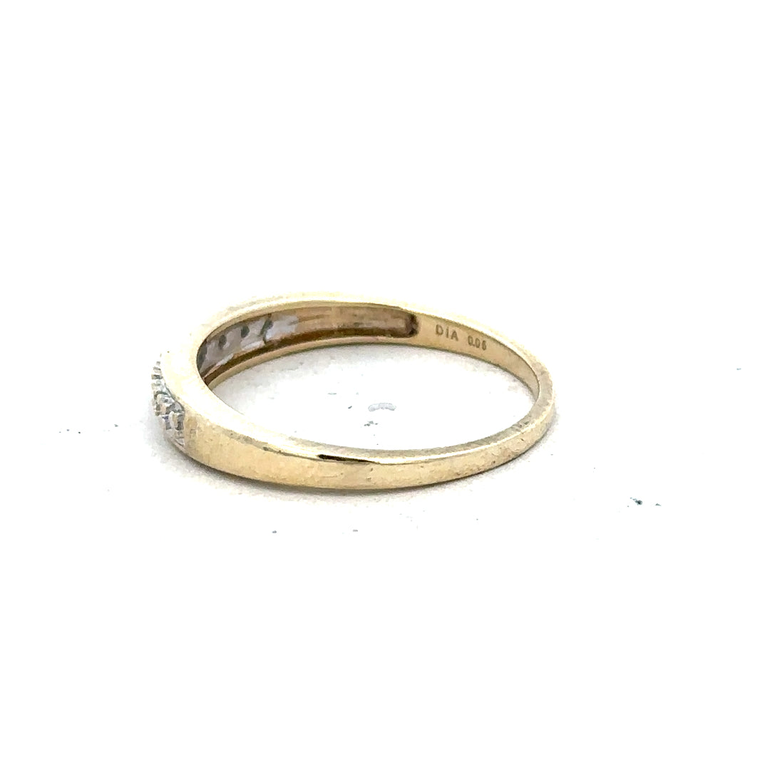 9ct yellow gold diamond ring size P with sparkling diamonds, showcasing a classic design and polished finish.