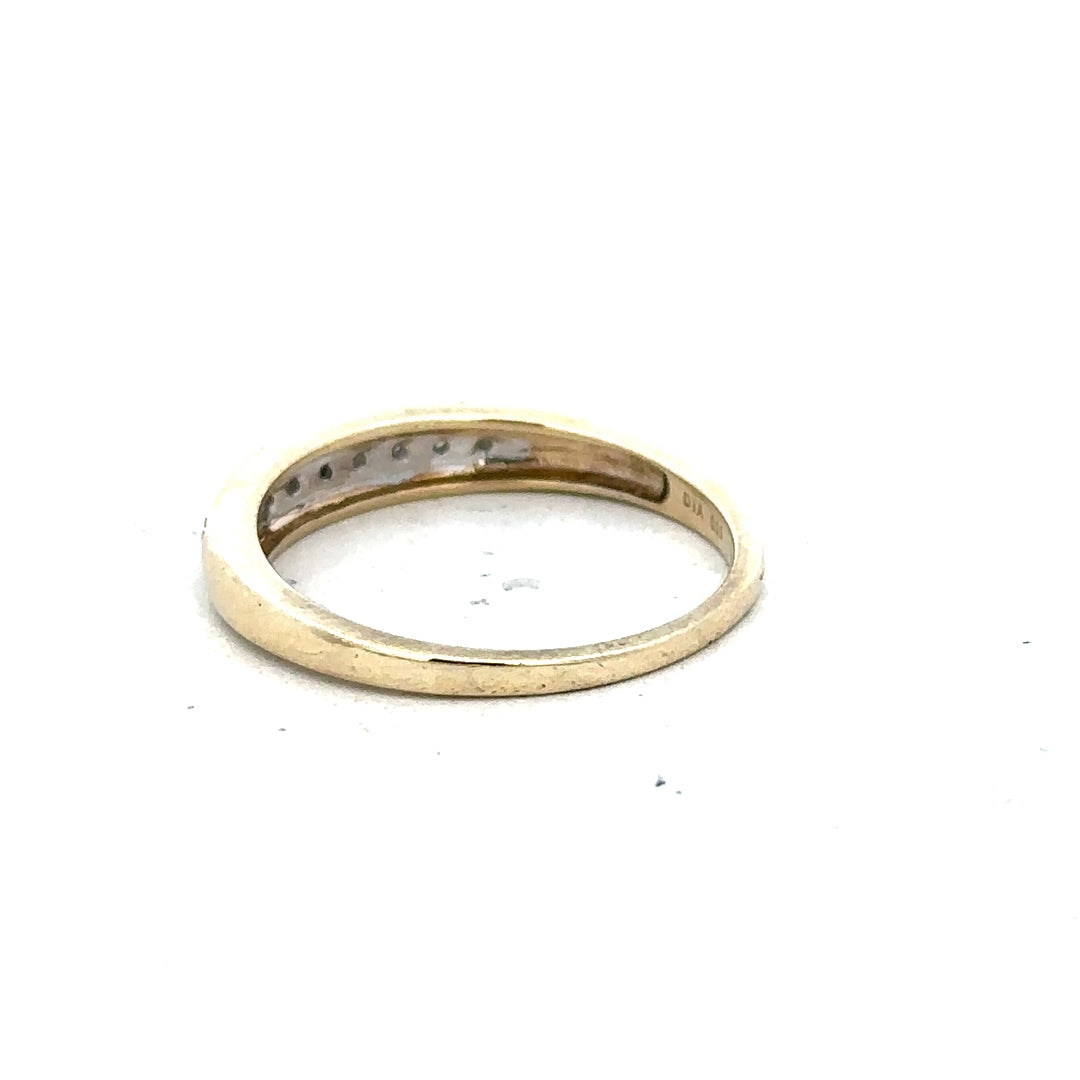 9ct yellow gold diamond ring in size P featuring a sparkling diamond set in an elegant band.