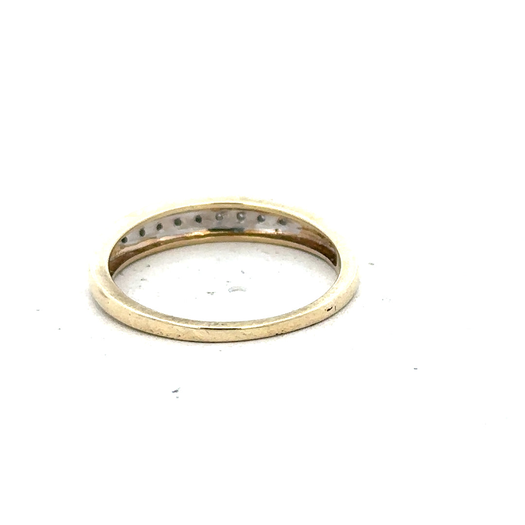9ct yellow gold diamond ring in size P with sparkling diamonds, showcasing elegant jewelry design.