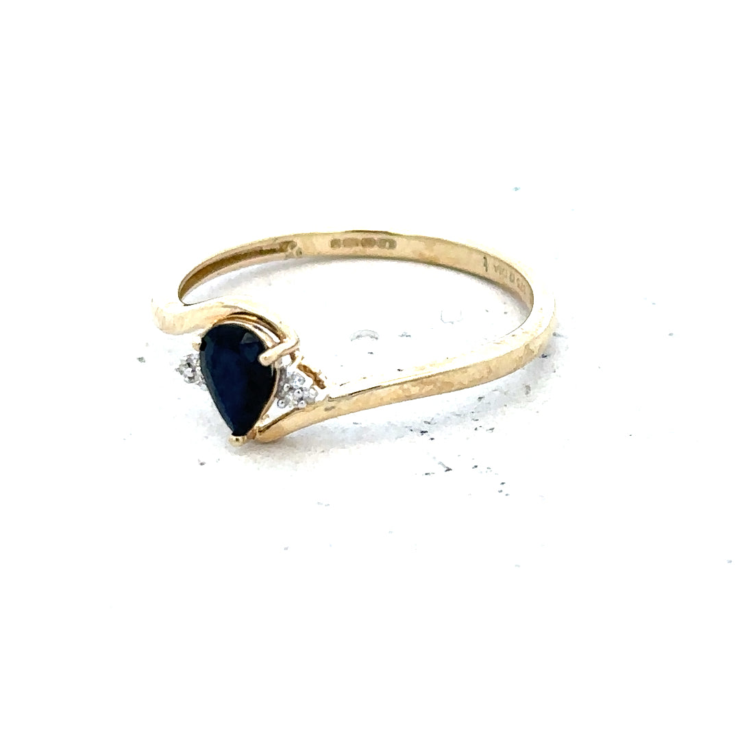 9ct yellow gold diamond ring in size P featuring a sparkling diamond, unbranded jewelry piece with elegant design.