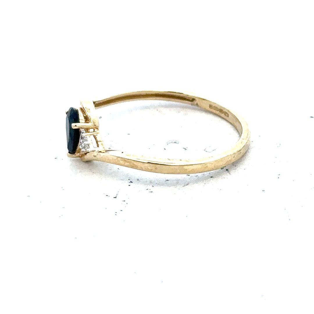 9ct yellow gold diamond ring in size P with sparkling diamonds, unbranded jewelry piece with detailed craftsmanship.