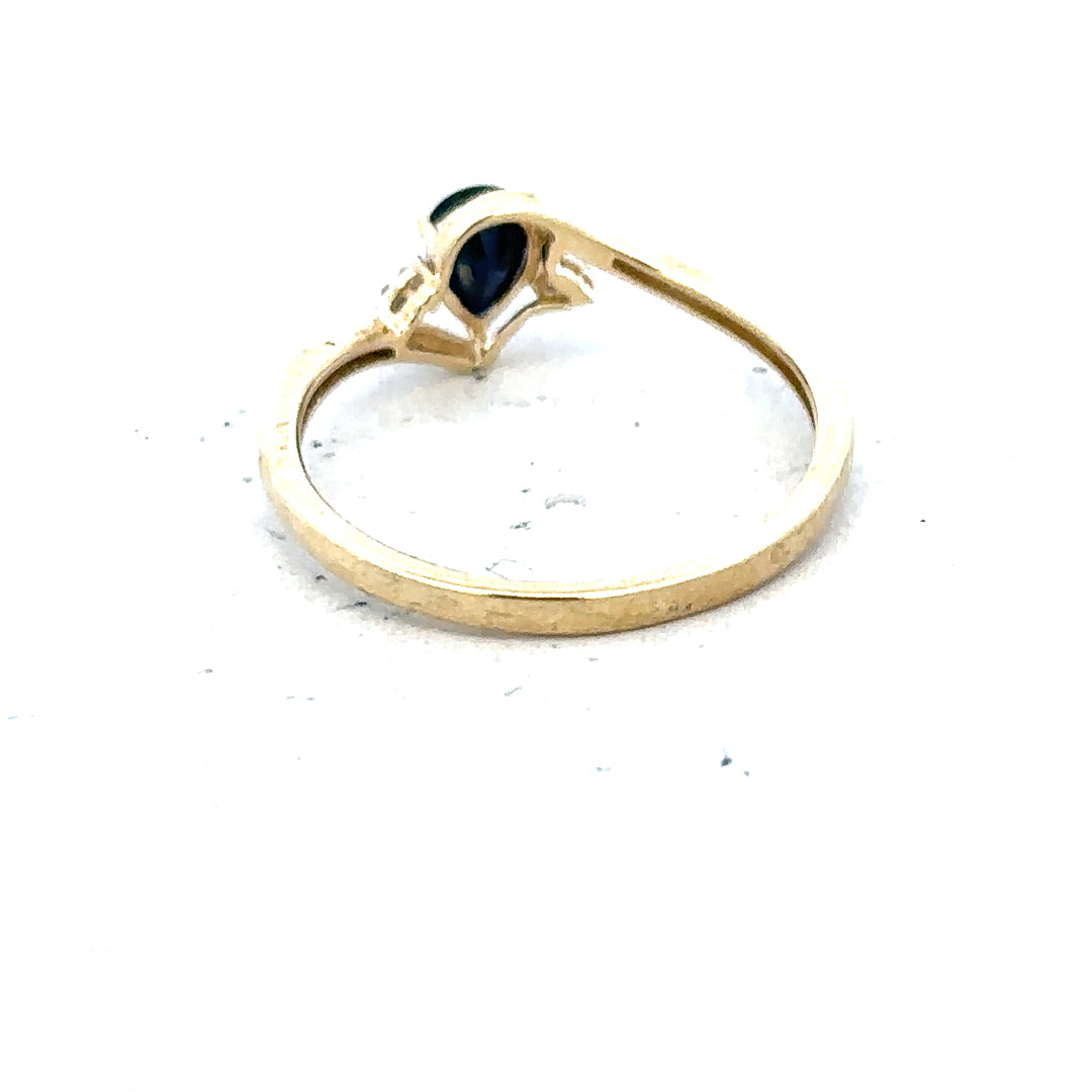 9ct yellow gold diamond ring in size P with sparkling diamonds, unbranded jewelry piece with elegant design.