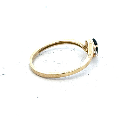 9ct yellow gold diamond ring size P with sparkling diamonds, showcasing a delicate and elegant design.