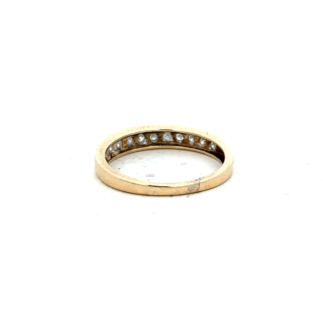 9ct yellow gold diamond ring in size P1/2, featuring a sparkling diamond setting and a polished band.