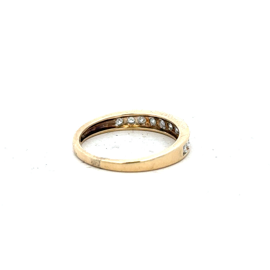 9ct yellow gold diamond ring size P1/2 with a sparkling diamond, showcasing a classic design and polished finish.