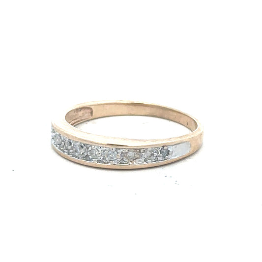 9ct yellow gold diamond ring in size Q with sparkling diamonds, unbranded jewelry piece displayed on a plain background.