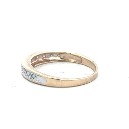 9ct yellow gold diamond ring size Q with sparkling diamonds, unbranded jewelry piece featuring a sleek gold band and intricate detailing.