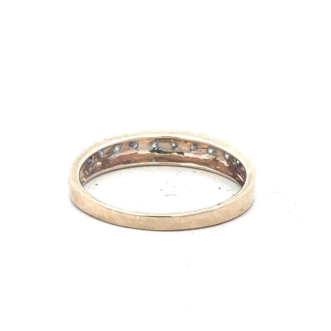 9ct yellow gold diamond ring in size Q, featuring a sparkling diamond setting and a sleek band design.
