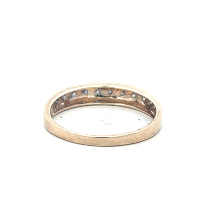 9ct yellow gold diamond ring in size Q, featuring a sparkling diamond setting and a sleek band design.