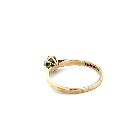 9ct yellow gold diamond ring in size R with a sparkling diamond, featuring a classic and elegant design.