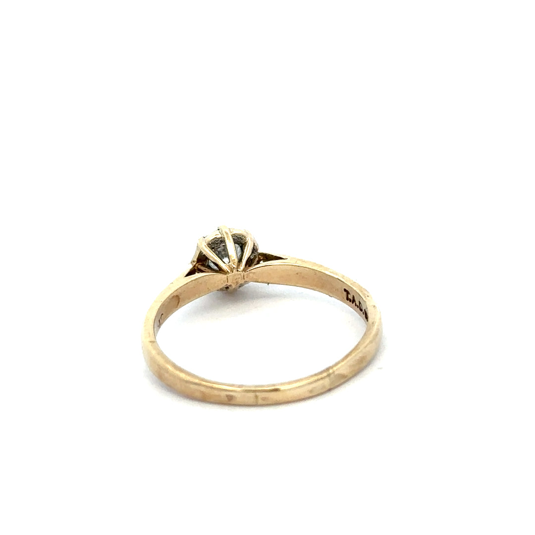 9ct yellow gold diamond ring in size R, featuring a sparkling central diamond and elegant band design.
