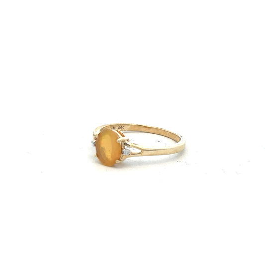 9ct yellow gold diamond ring size T1/2 with sparkling diamonds, showcasing elegant craftsmanship and a polished gold band.