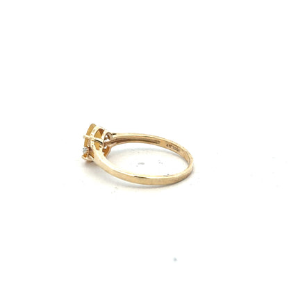 9ct yellow gold diamond ring in size T1/2, featuring a sparkling diamond, showcasing elegant jewelry design.