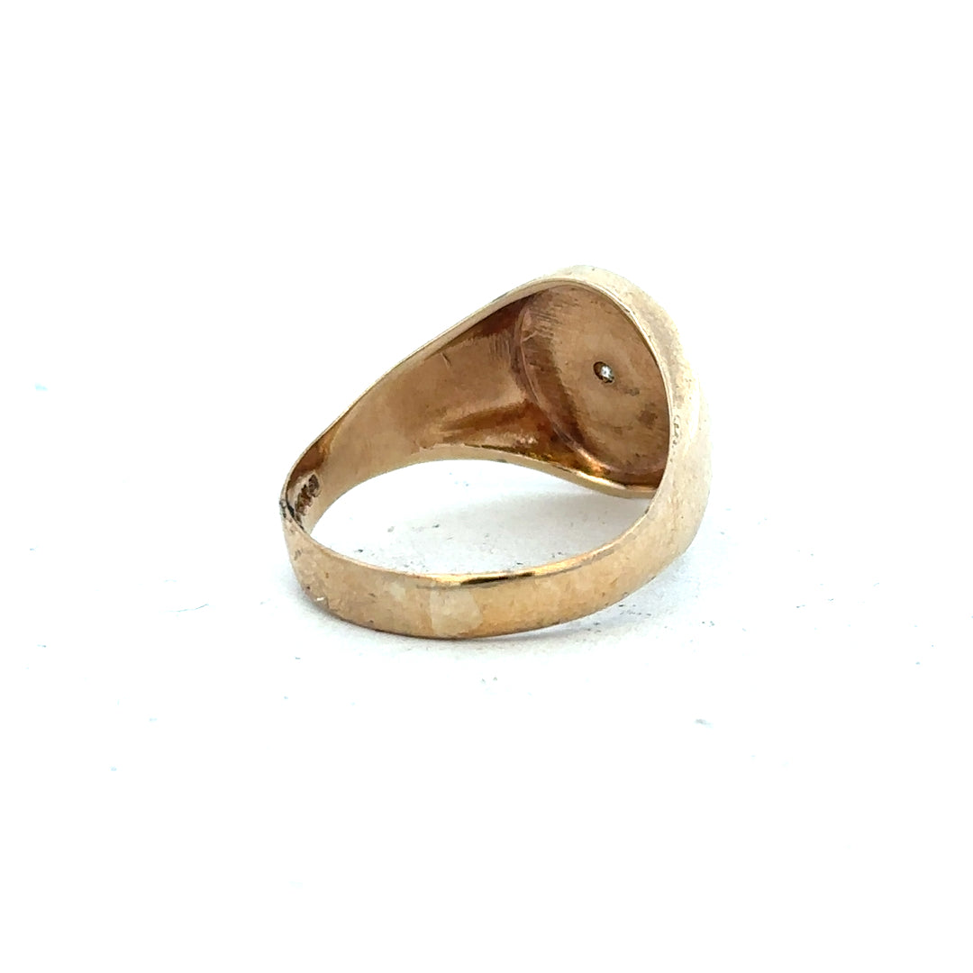 9ct yellow gold diamond signet ring in size U, featuring a smooth polished surface and a subtle diamond accent.