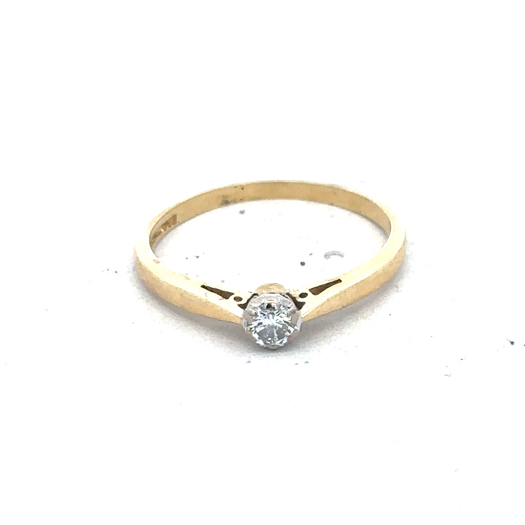 9ct yellow gold diamond solitaire ring showcasing a single sparkling diamond set in a classic band.