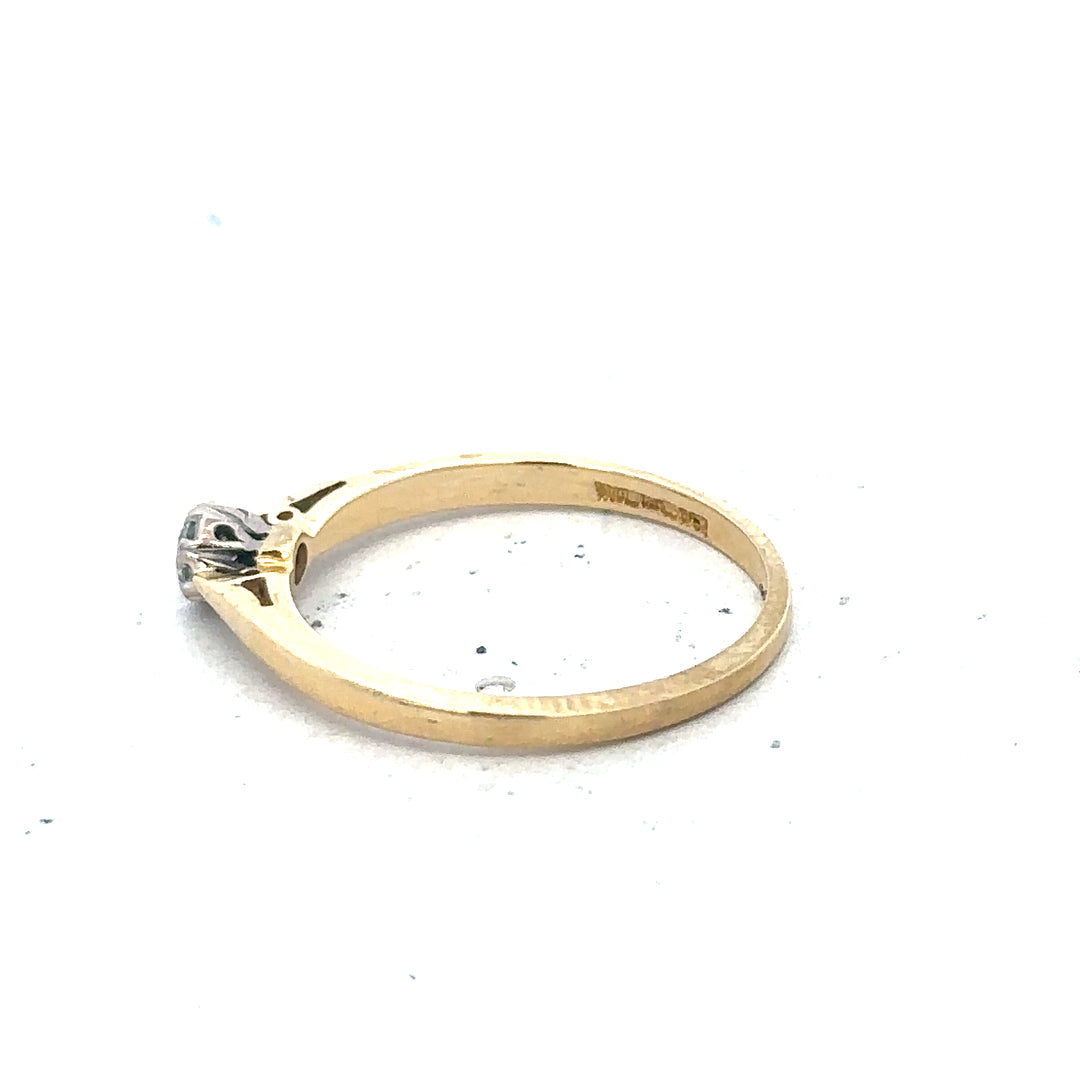 9ct yellow gold diamond solitaire ring with a single sparkling diamond set in a classic band.