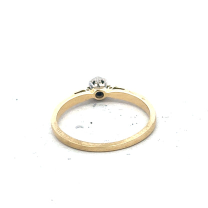 9ct yellow gold diamond solitaire ring with a sparkling central diamond and a sleek, polished band.