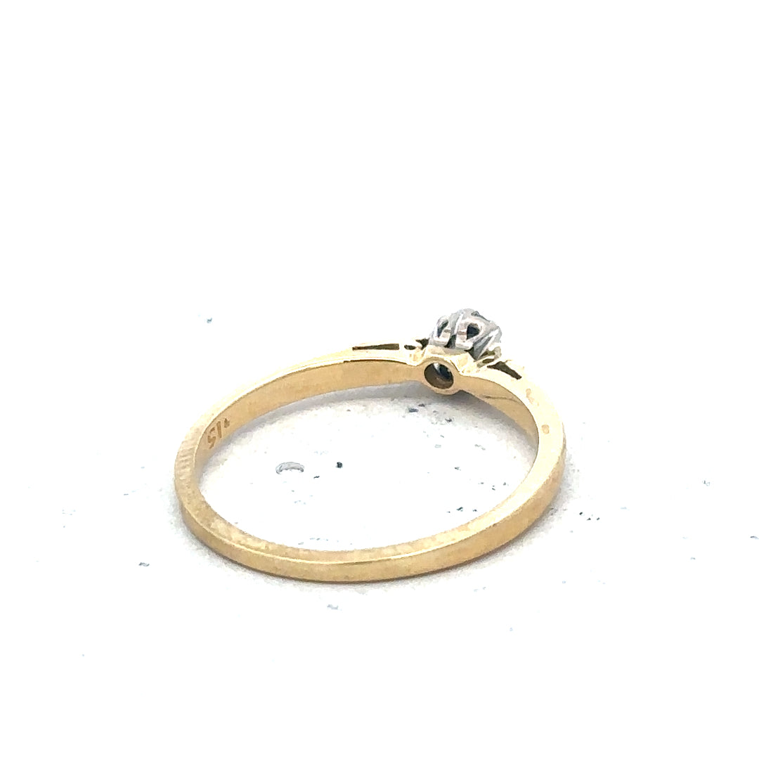 9ct yellow gold diamond solitaire ring showcasing a sparkling central diamond on a sleek gold band.