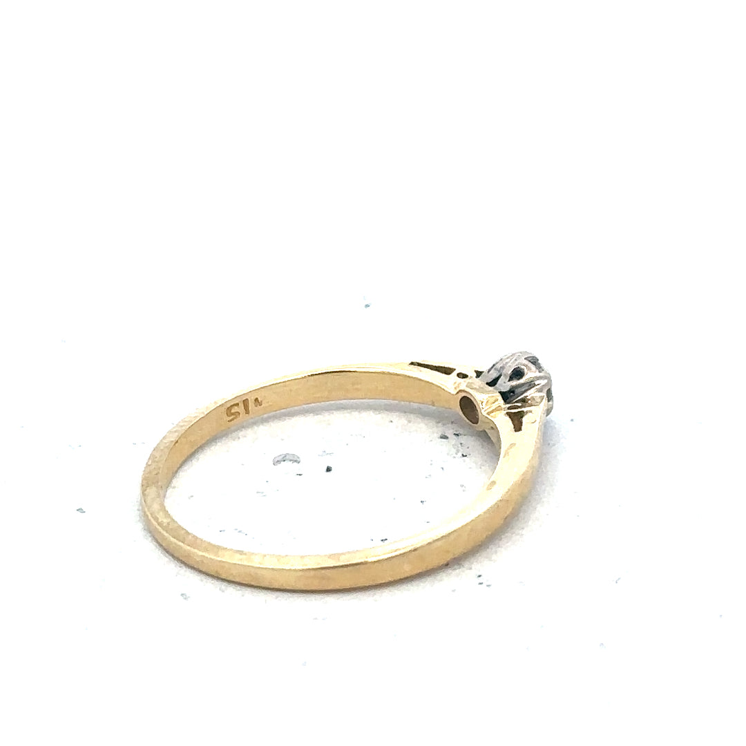 9ct yellow gold diamond solitaire ring with a single sparkling diamond set in a simple band.