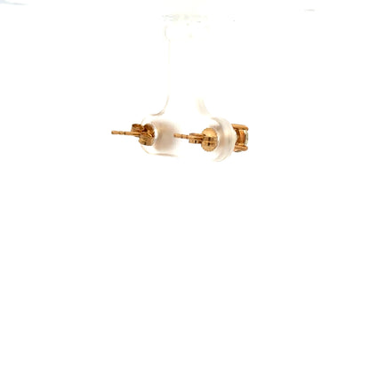 9ct yellow gold earrings, unbranded, weighing 1.2g, featuring a classic design, shown on a plain background.