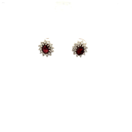 9ct yellow gold earrings weighing 1.2g, unbranded, displayed in a close-up image showing their simple, elegant design.