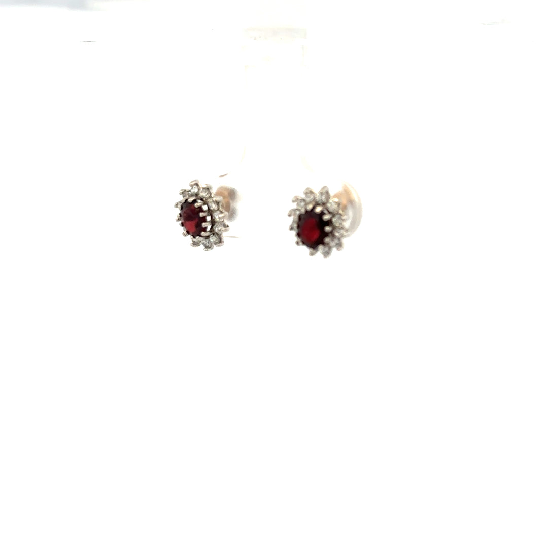 9ct yellow gold earrings weighing 1.2g, unbranded, featuring a classic design with a polished finish.