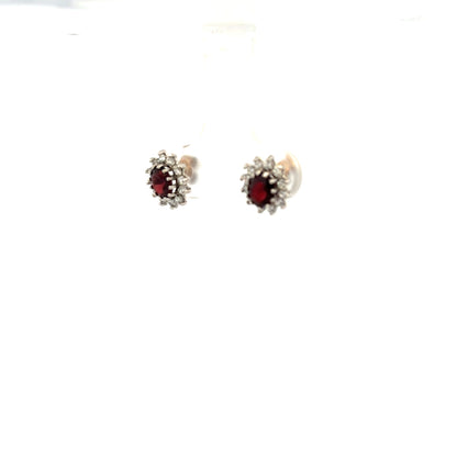 9ct yellow gold earrings weighing 1.2g, unbranded, featuring a classic design with a polished finish.